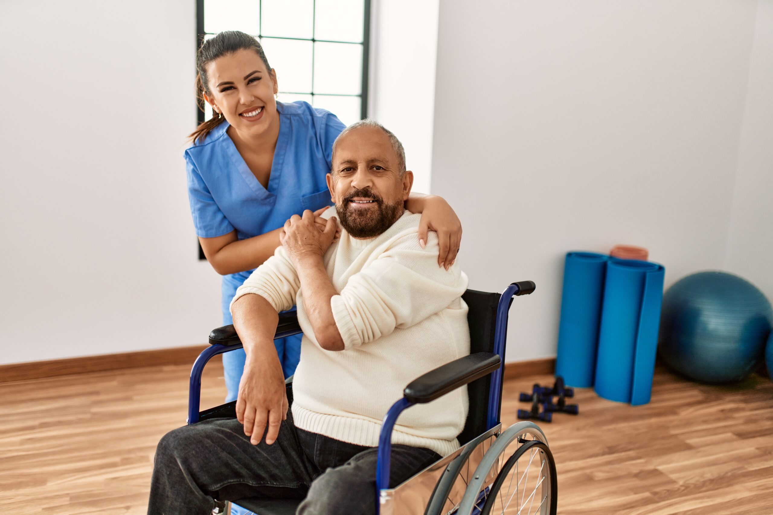 Senior,Man,Sitting,On,Wheelchair,And,Geriatric,Nurse,At,Rehabilitation